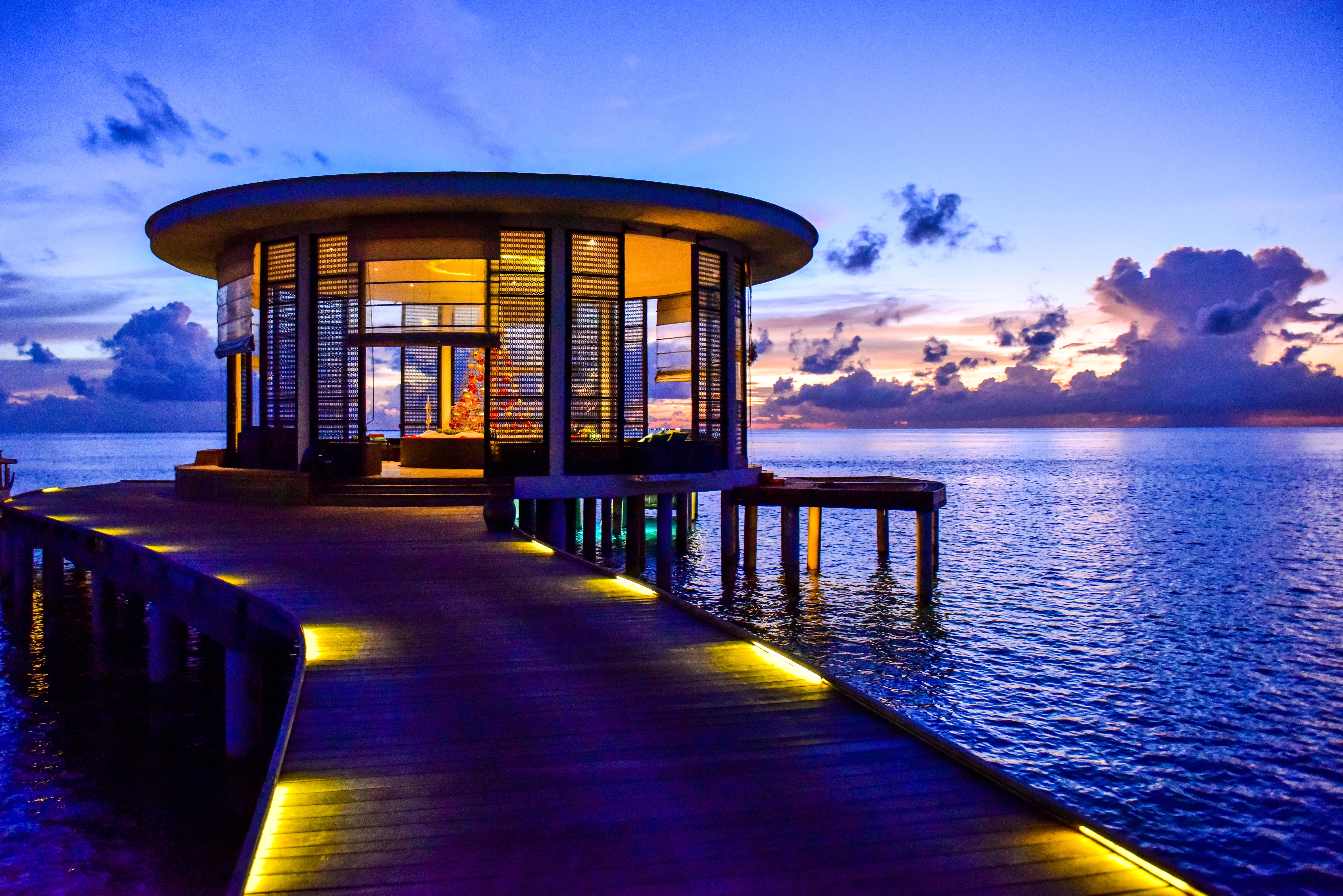 Overwater pavilion at sunset